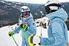 alpinutøvere i Helly Hansen-klær